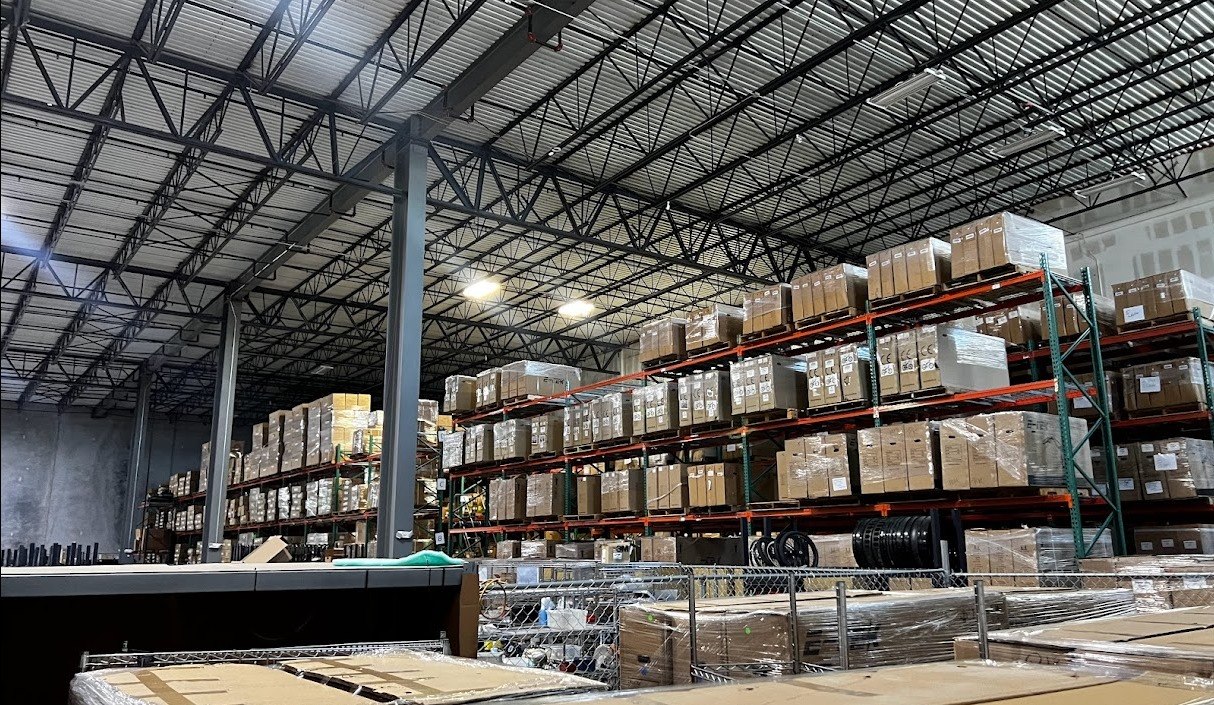 Large-scale warehouse liquidation project showing inventory depth and facility size