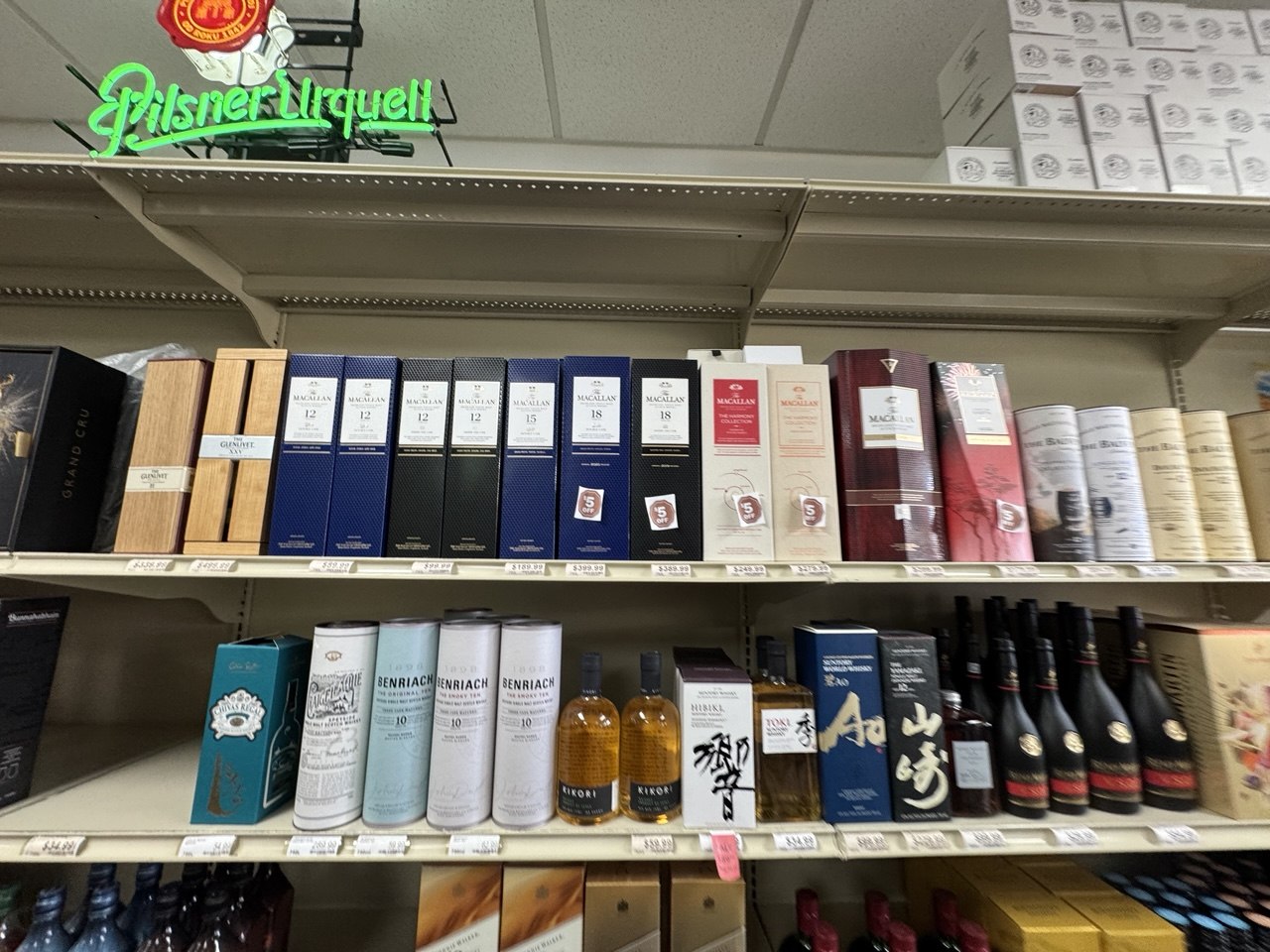 Premium liquor and boxed inventory detail from short-notice liquidation